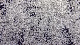 Ceramic beads for surface treatment